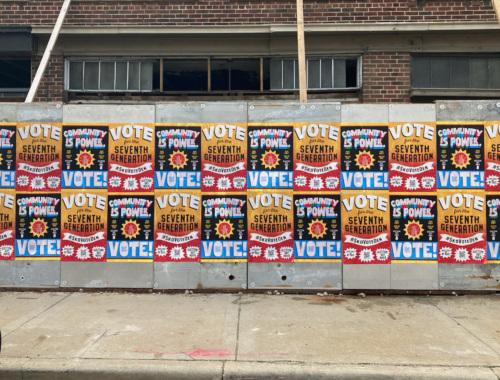 Wheatpaste signs encouraging passerbys to vote.