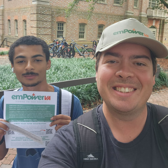 Volunteers in Virginia pose for a photo while they register voters